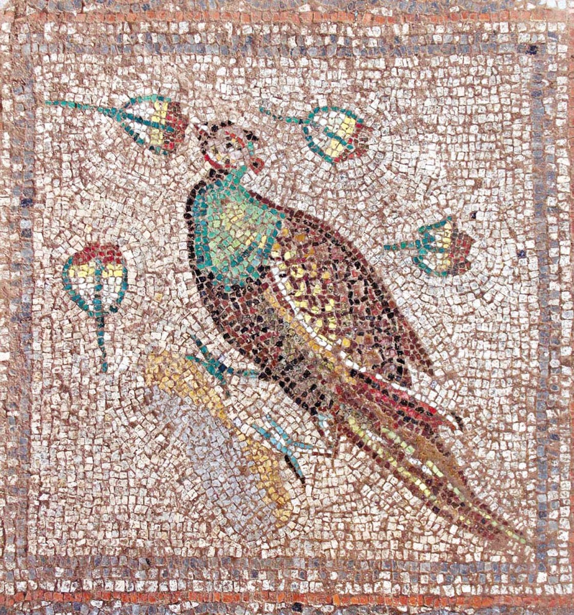 The mosaics are decorated with natural stones. You can see various shades of red, blue and green.