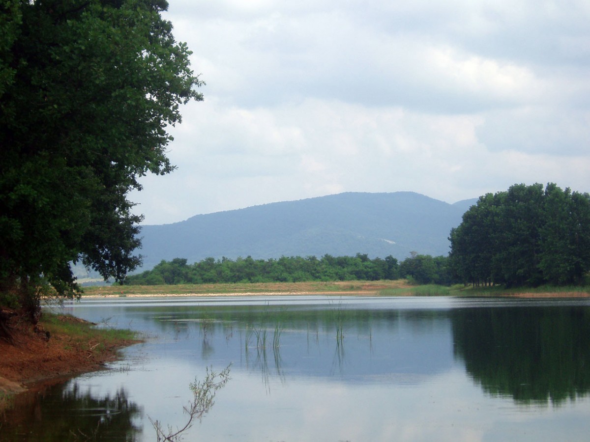 A prehistoric fortified village lies beneath the waters of Lake Ticha (above), in Bulgaria.