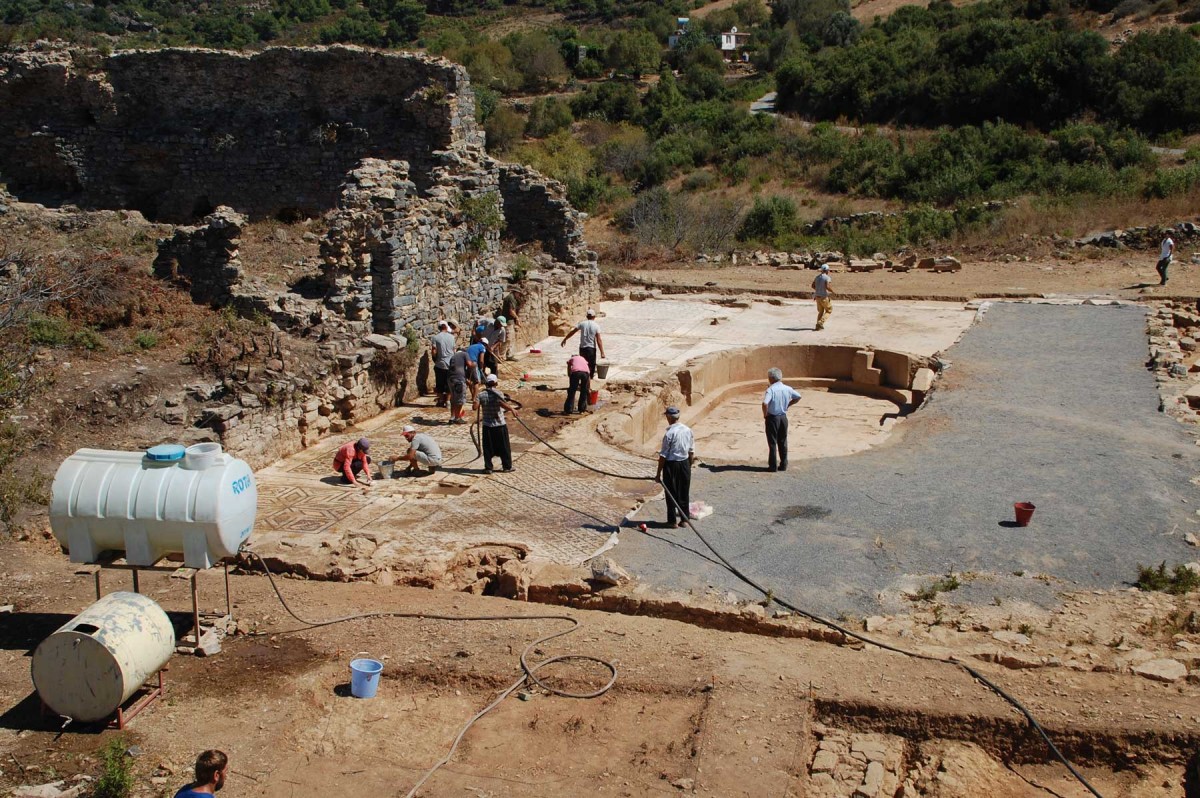 Members of a UNL-led archeology team uncover the western portion of a 1,600-square-foot mosaic in southern Turkey. (Michael Hoff, UNL)