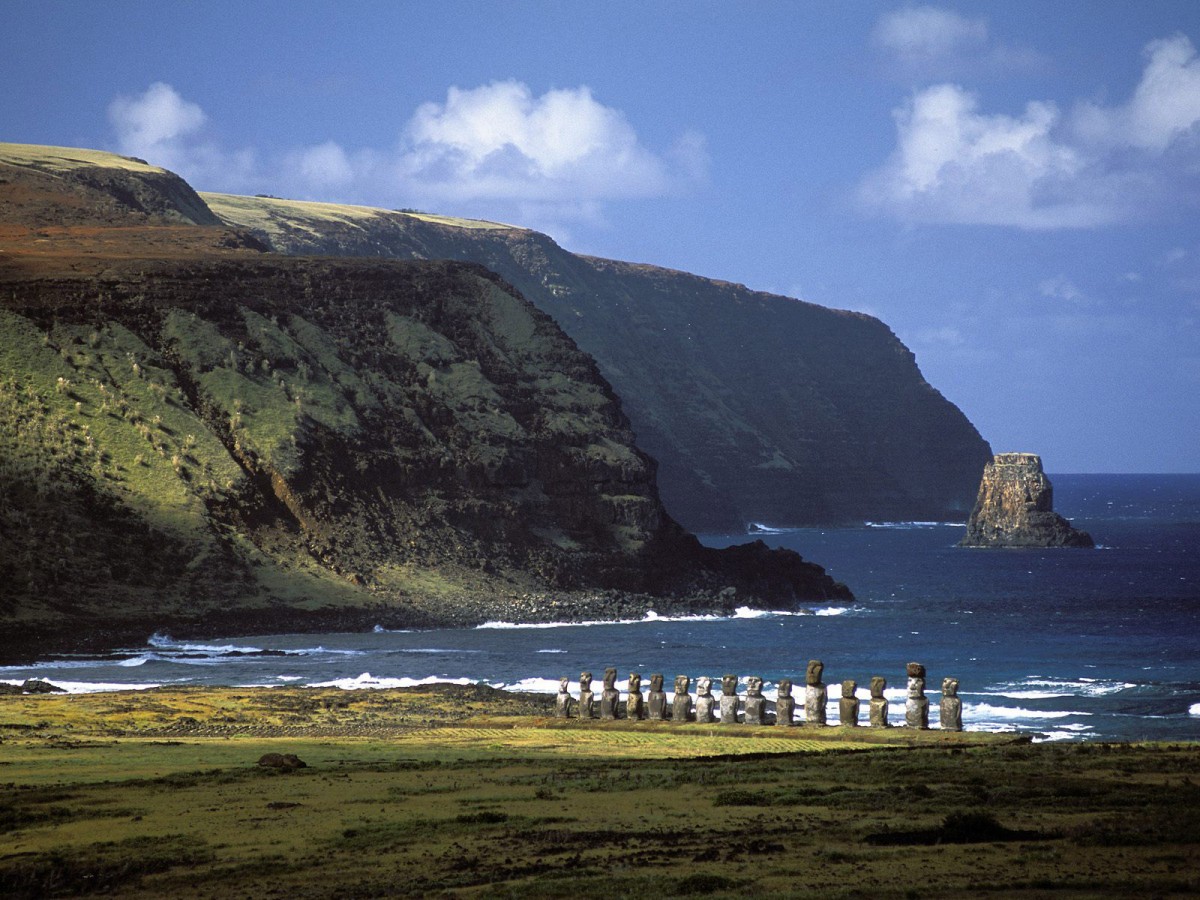 An Easter Island beach, complete with a series of Moai facing inlands. 