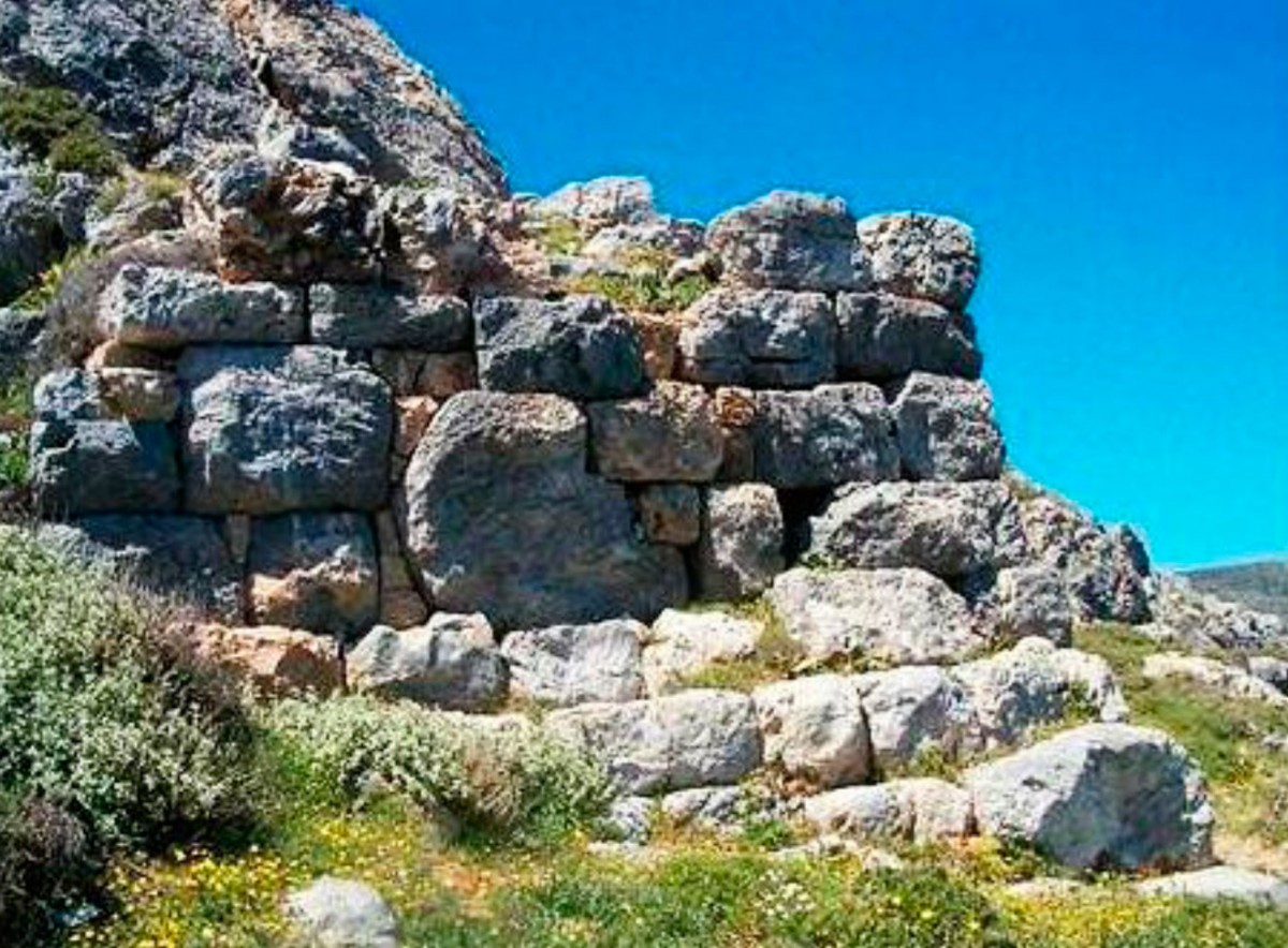 Fig. 28. View of the large fortification tower at the eastern part of the fort. The tower is not a continuation of the fortification wall, but it stands on the rock and it is located on the highest point guarding the house of the “higher” officer of the city (Fig. 20). The preserved height of the fortification tower is 9m and it is constructed of local material that obliged its relatively “rough” building. In picture 29 is visible the northern side of the tower.