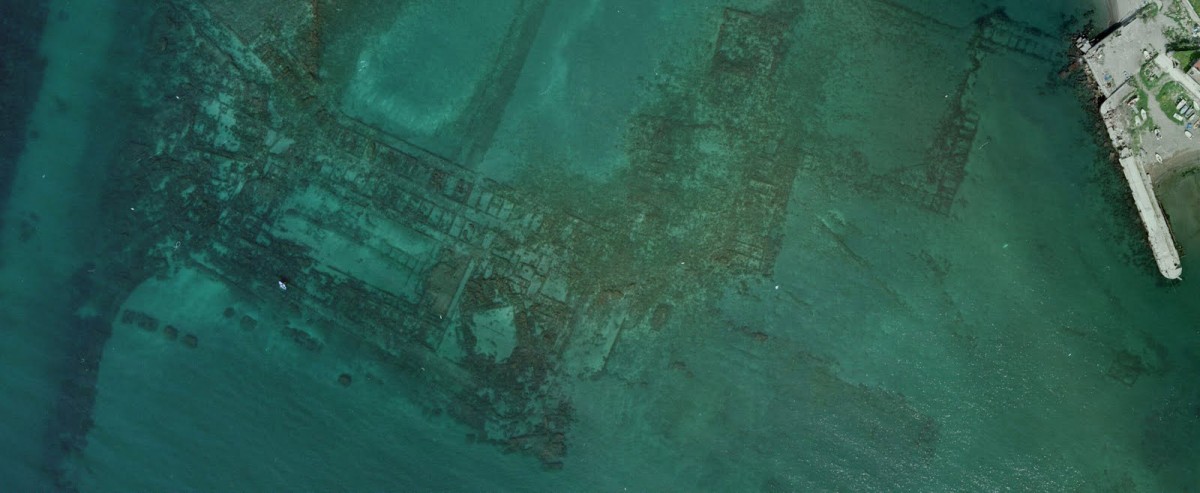 The sunken remains of the Roman city of Baiae and Portus Julius port are obvious even from an aerial view of the area off the coast in the Bay of Naples.