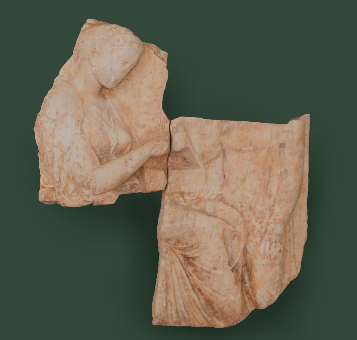 Fig. 3. Two sections of a funerary relief bought by the Getty Museum in the 1970s and proved to be part of a third in the collections of the Kanellopoulos Museum. They were repatriated in March 2012. (©YPPOA/DTPPA)