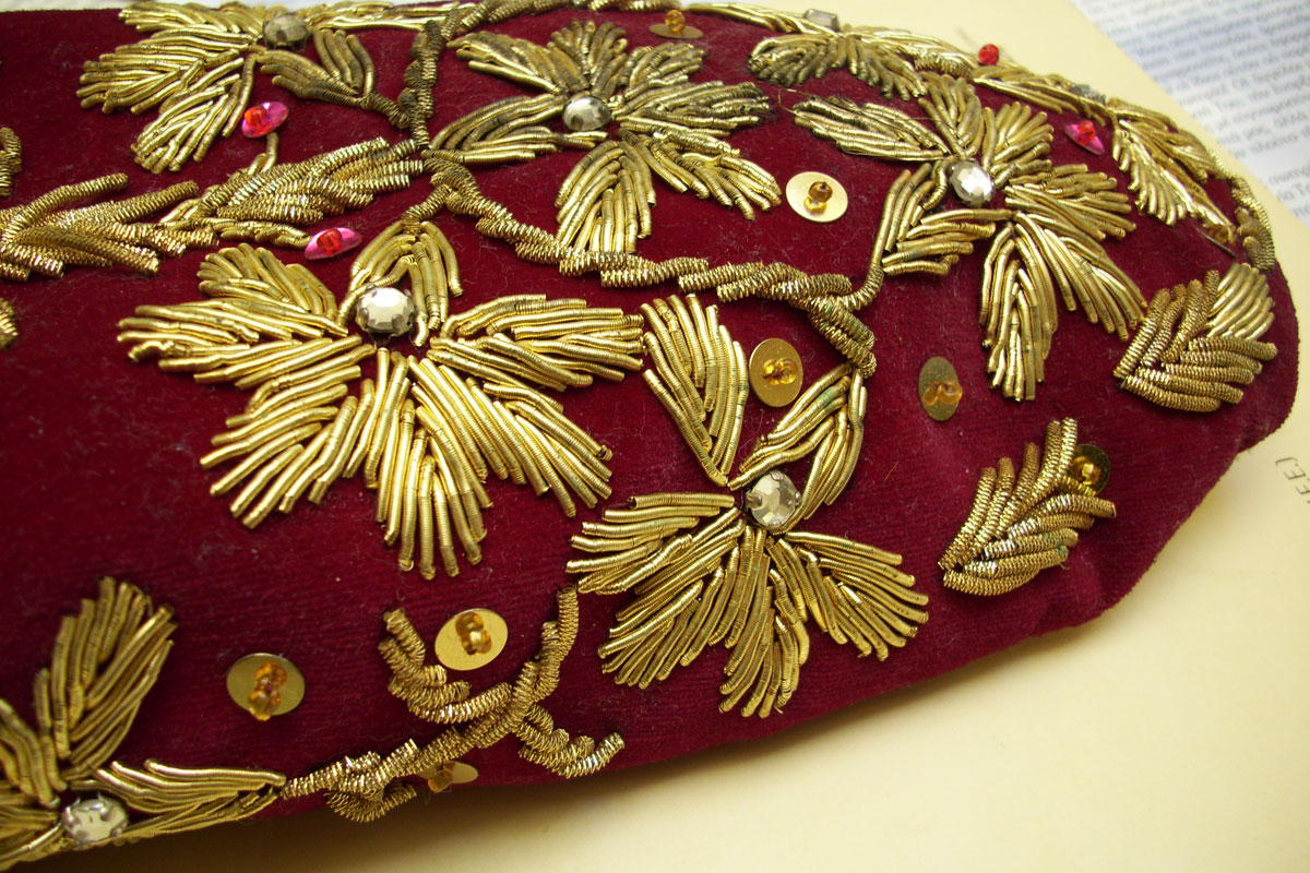 Fig. 2. Metallic threads, straight and fil tire stitching with sequins on the velvet  surface of the slipper. (photo: Chr. Karydis)