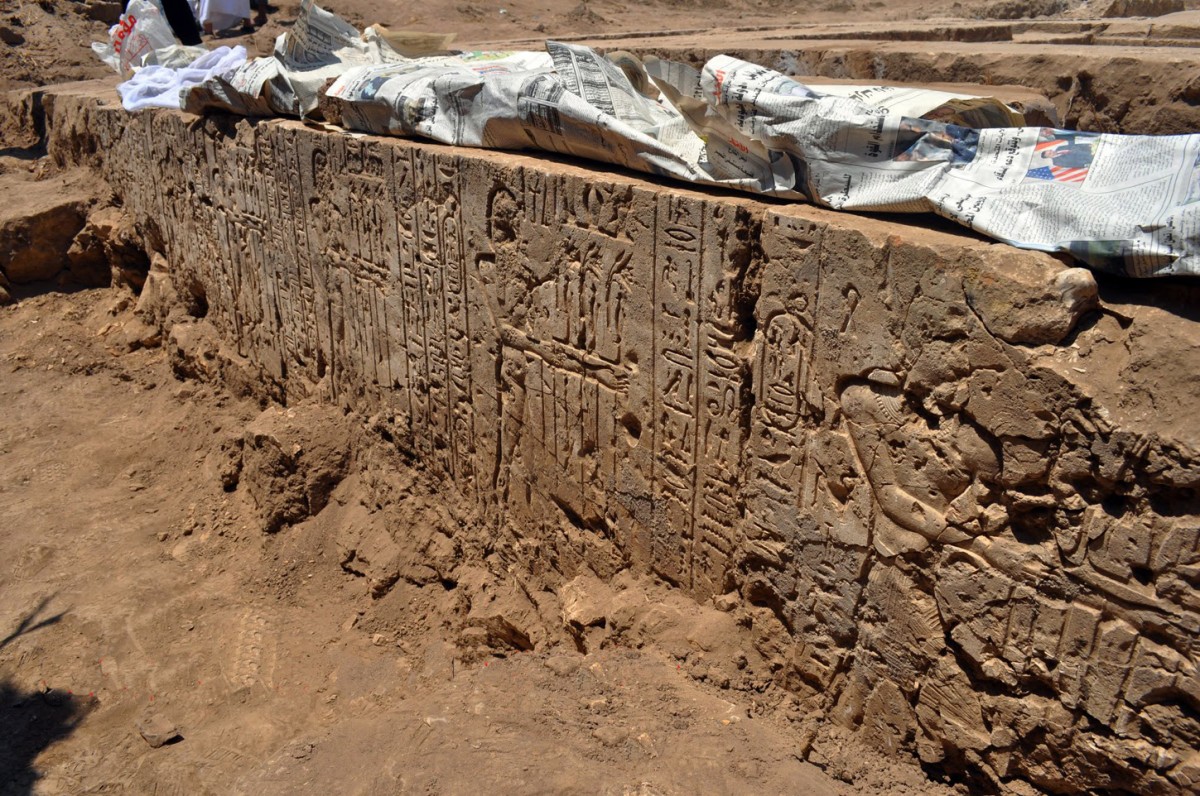 Pharaonic figure followed by  figures of Nile gods, known also as fecundity figures. The cartouche is that of Ptolemy II Philadelphus. Gebel El-Nour, Egypt. Photo: Luxor Times magazine.