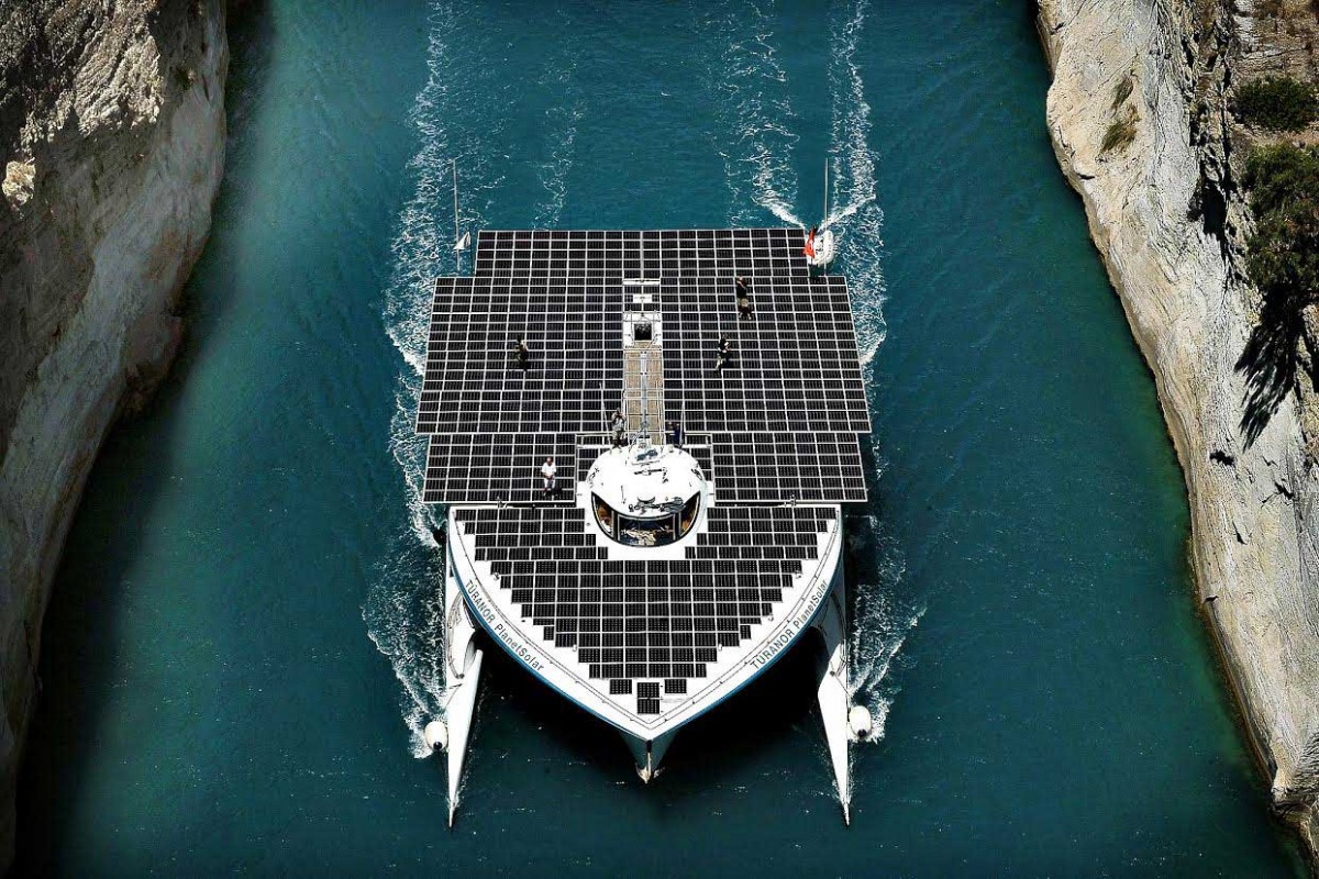 The world’s largest solar-powered boat, “MS Turanor PlanetSolar” sails through the Corinth Canal. Photo: Valerie Gache/AFP. 