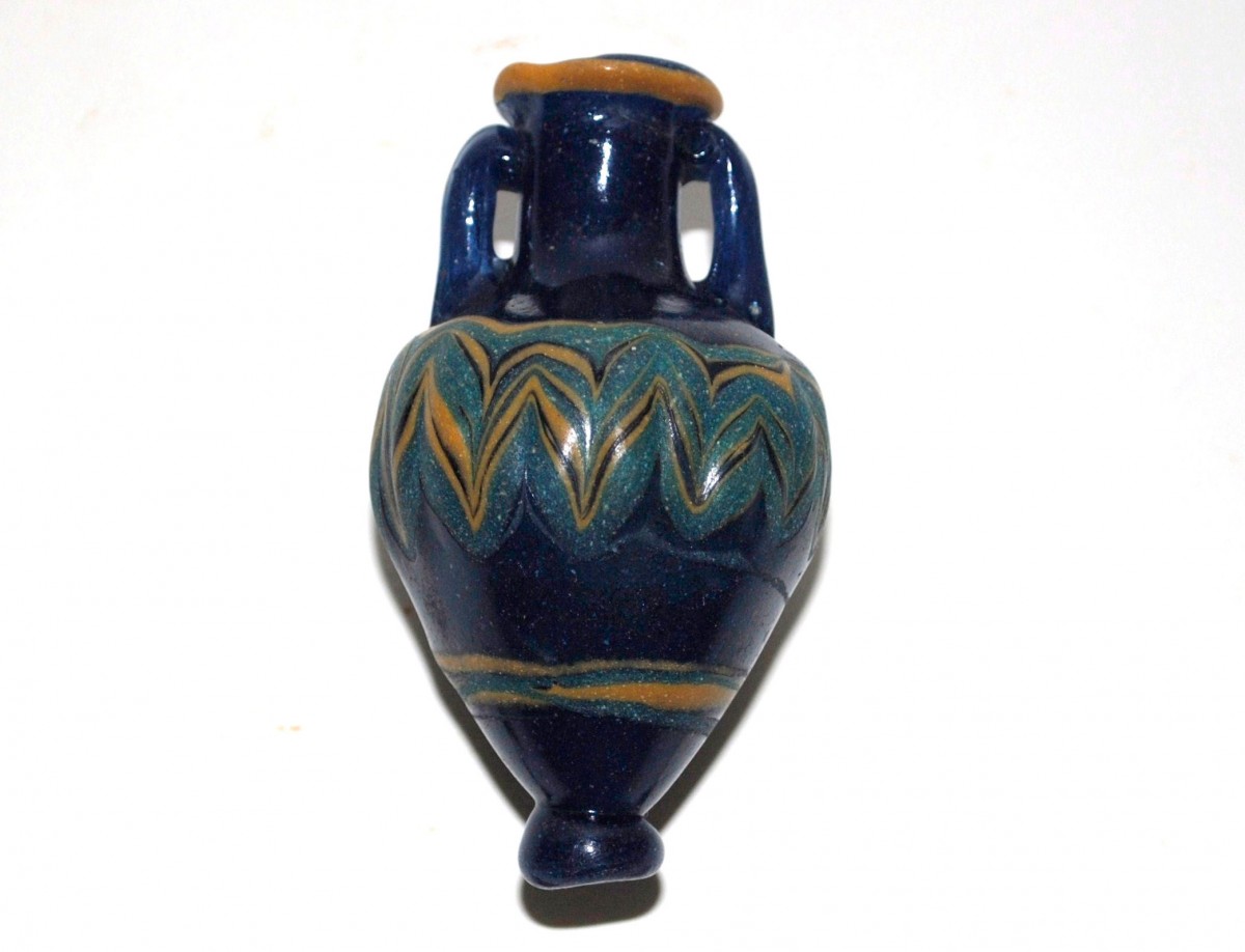 Fig. 7. Small glass amphora.