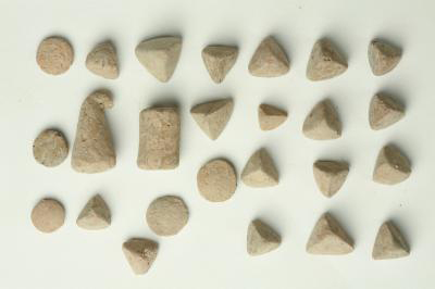 Examples of tokens discovered at Ziyaret Tepe are displayed. Credit: Ziyaret Tepe Archaeological Project