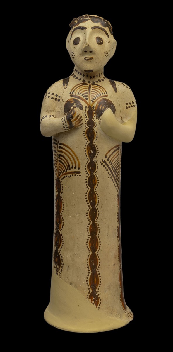 Female figurine. Late Helladic IIIB2 (second half of the 13th century BC). Clay. H.0.3 m, body d. 0.07 m, d. base 0.09 m. Mycenae, Acropolis, Cult Centre “Temple”, Room 19. Mycenae, Archaeological Museum, ΜΜ294. 