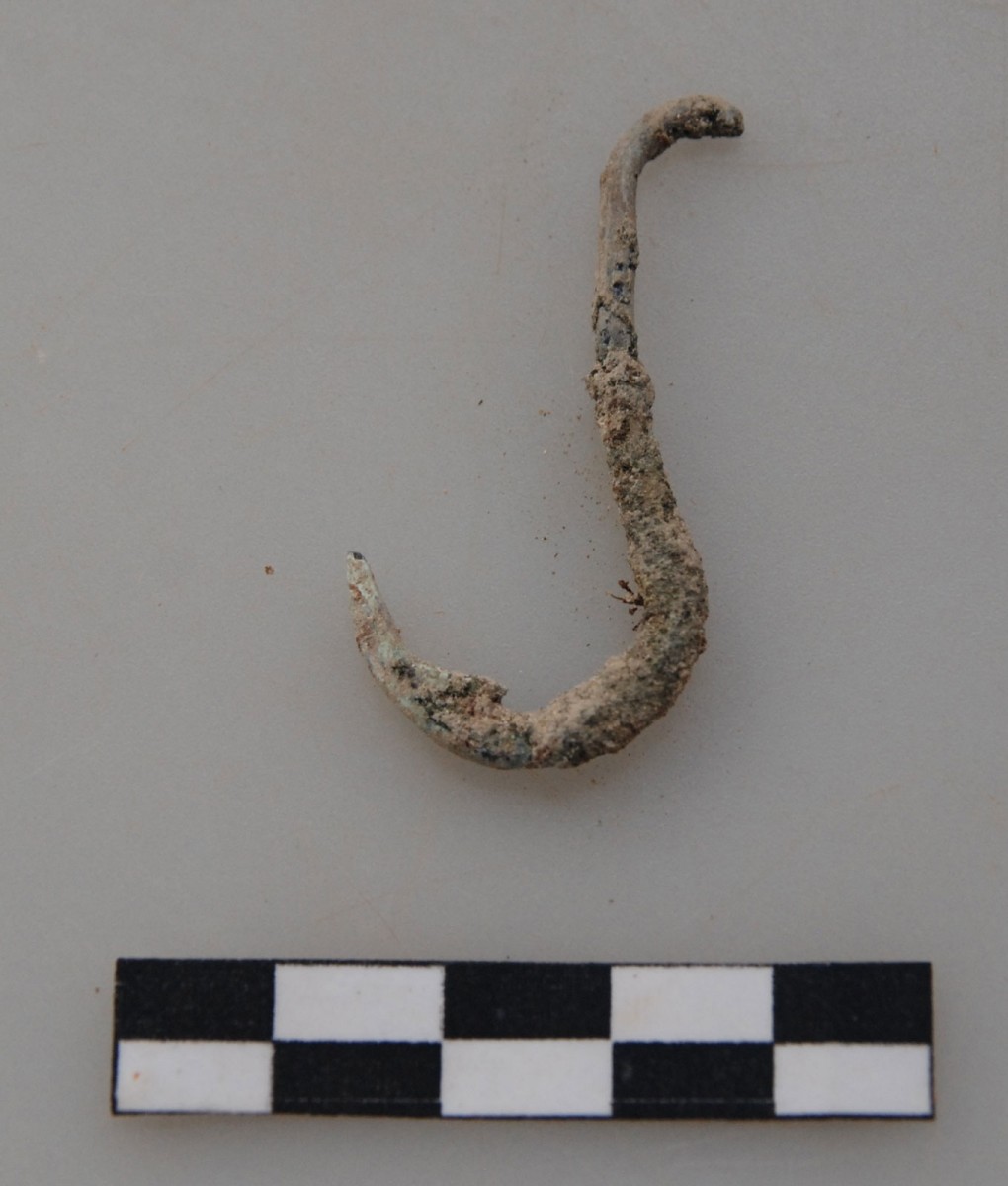Fig. 5. Metal object from a grave revealed during the rescue excavation at the “Rema Xydias” in Platamonas (Pieria, Greece). Photo: Ephorate of Antiquities of Pieria