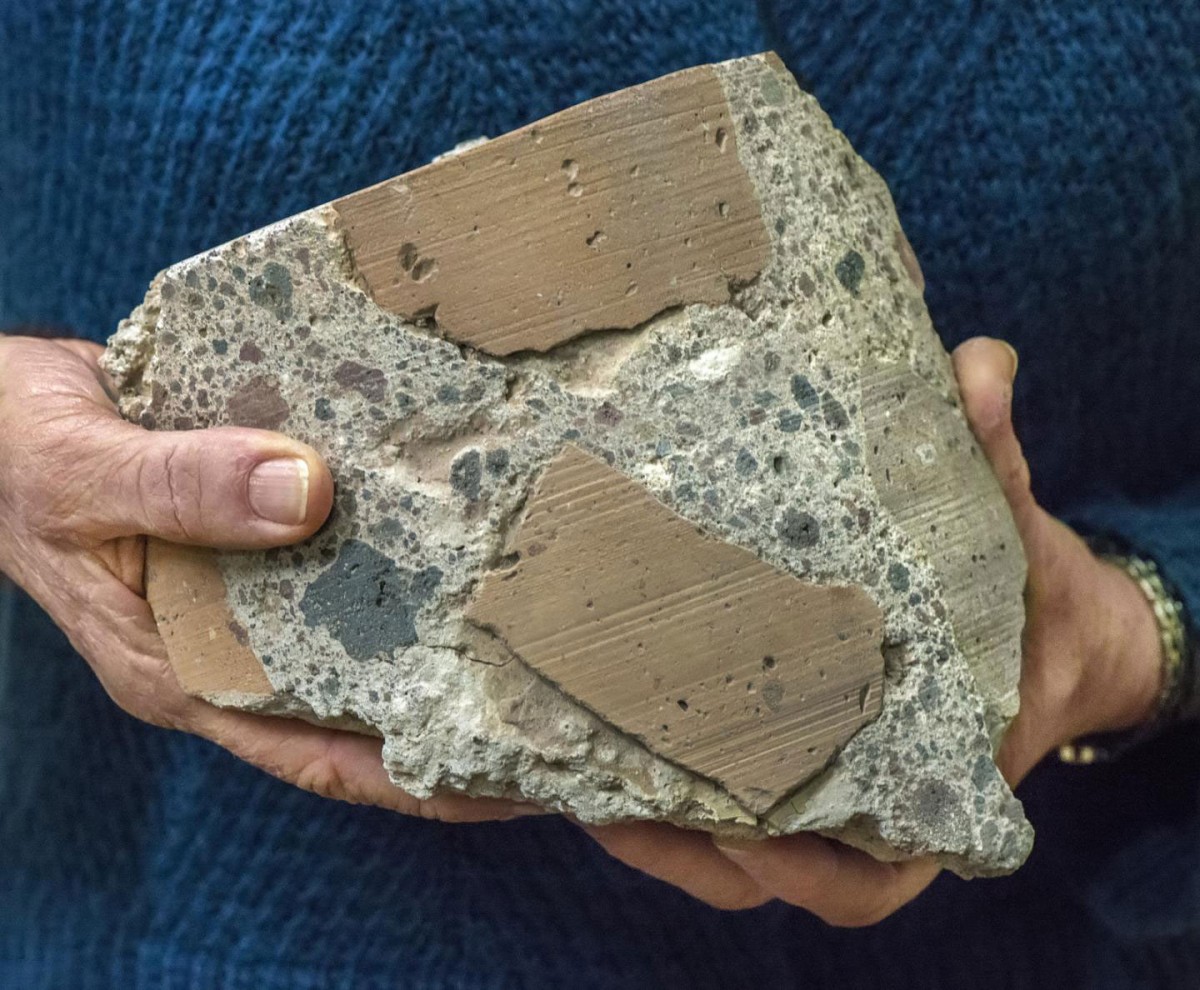 Ancient Roman concrete consists of coarse chunks of volcanic tuff and brick bound together by a volcanic ash-lime mortar that resists microcracking, a key to its longevity and endurance. Credit: Photo by Roy Kaltschmidt, Berkeley Lab.