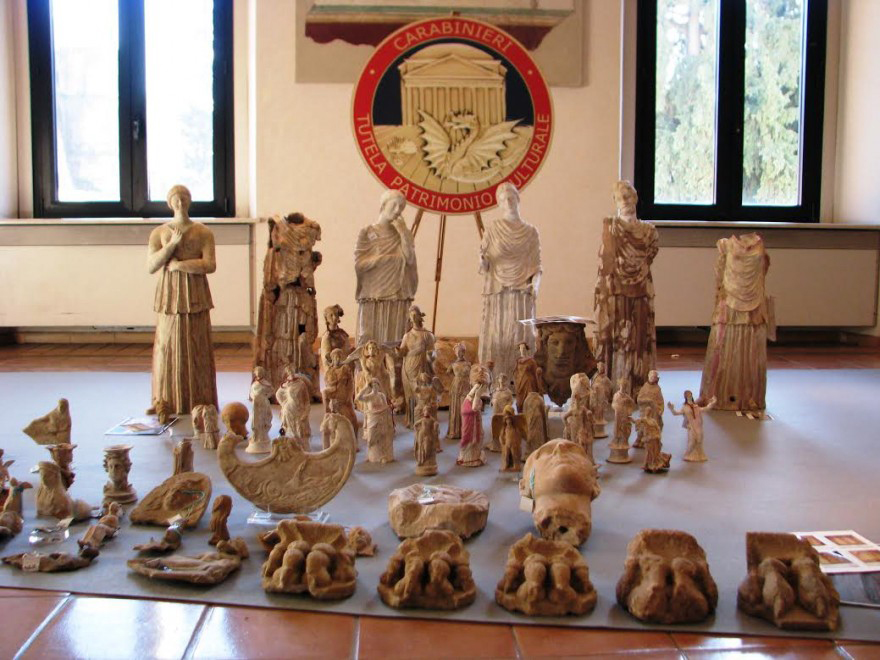The looted antiquities were laid out at the Terme di Diocleziano museum during a press conference held on Wednesday, January 21, 2015, in Rome. Credit: Repubblica.