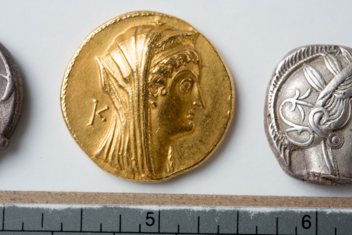 Obverse (heads) of a gold octodrachm of Arsinoe II (285 to 246 B.C.). Photo Credit: Douglas Levere/