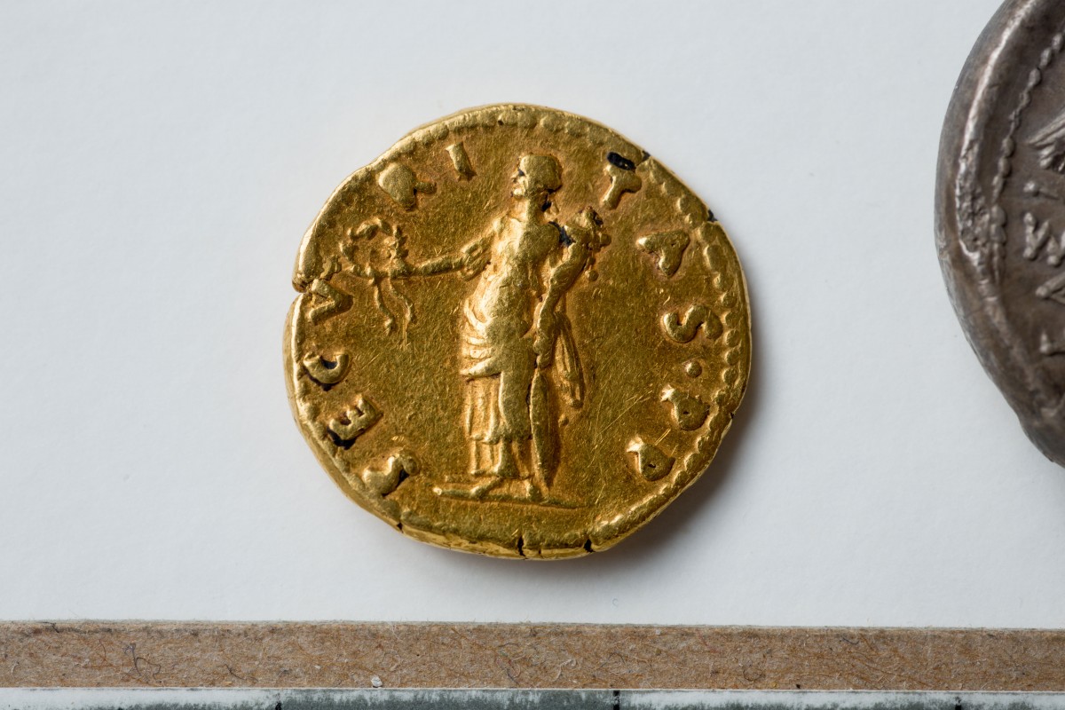 View of a “remarkably rare” coin — a gold aureus of the Roman emperor Otho, who reigned for a mere three months in A.D. 69. Photo Credit: Douglas Levere.