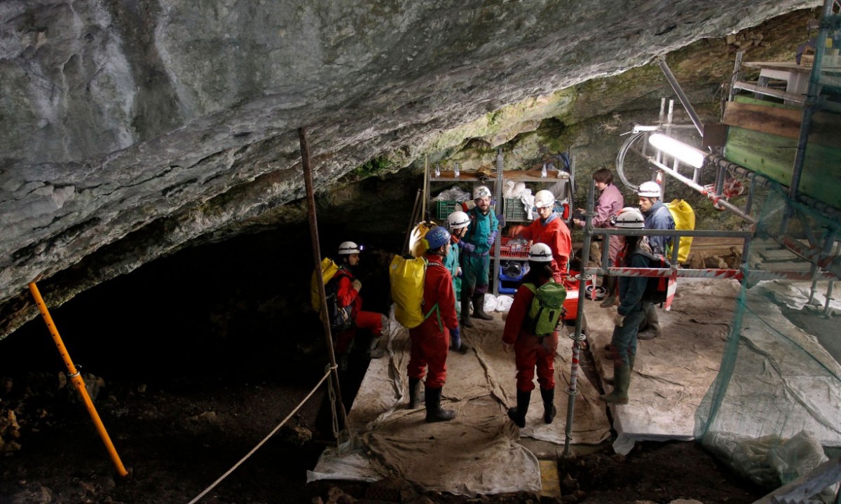 Workers at the Atapuerca archaelogical site preparing to go down to the Sima de los Huesos in 2010. The site is home to a large number of early human remains. Photo Credit: AFP/Getty Images.