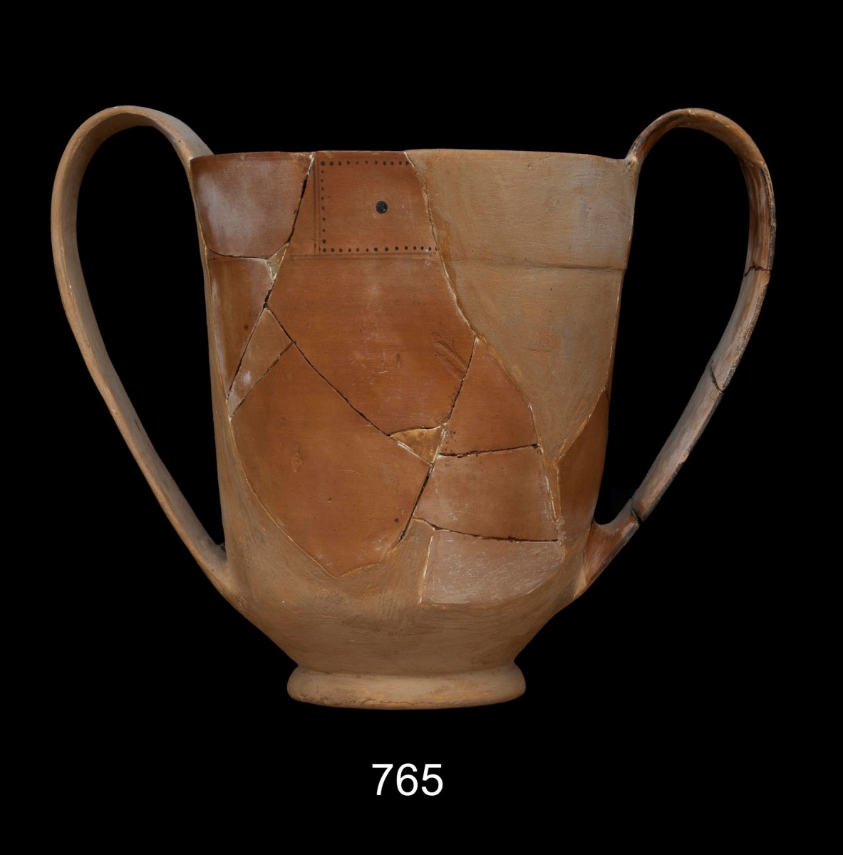 Kantharos from the Troad. Drinking cup from a cult sacrificial area and ceremonial commensality discovered below floor level in the Hall of Choral Dancers. 1st half of the 7th cent. BC. Credit: Acropolis Museum.

