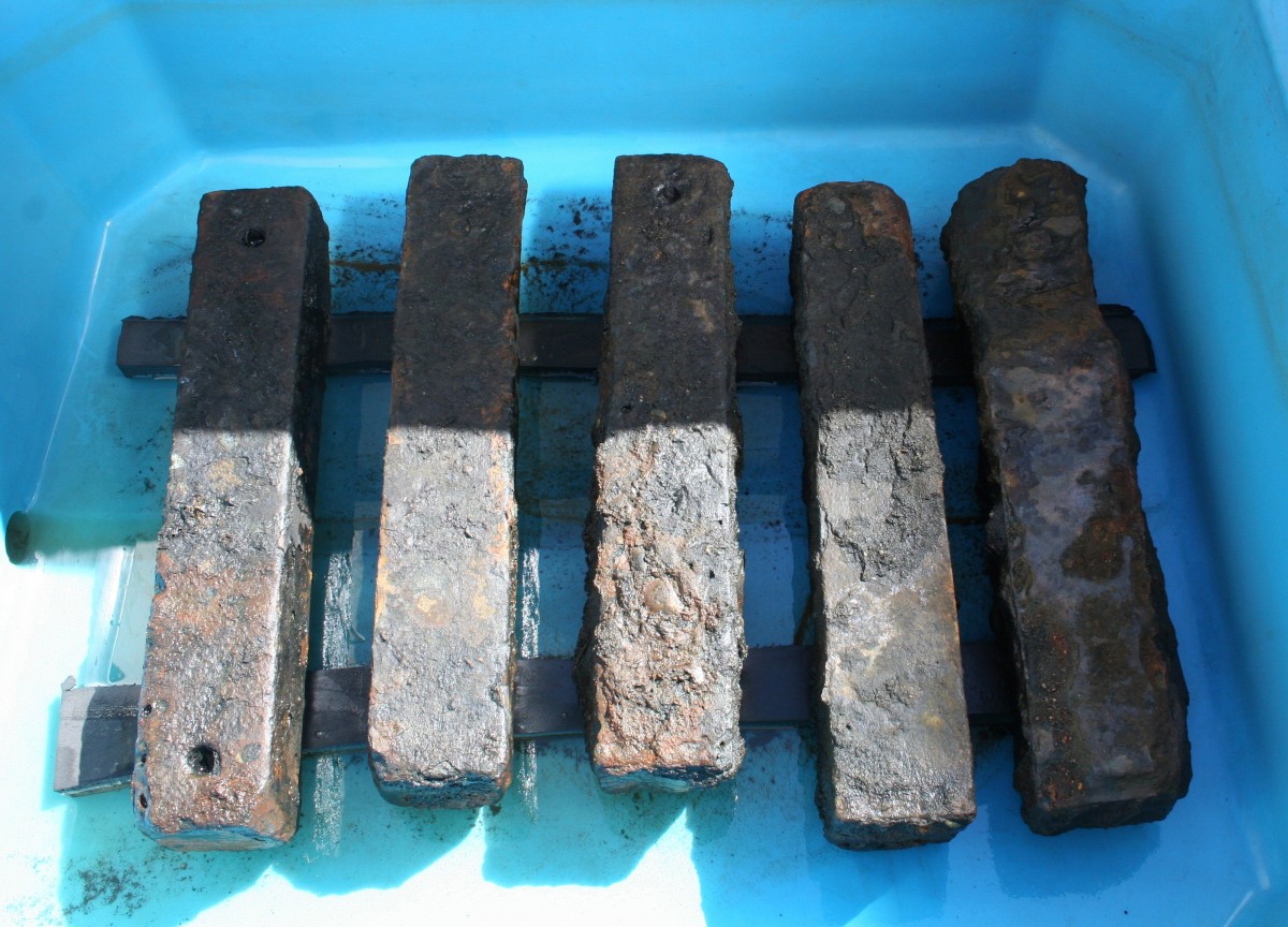Iron ballast recovered from the São José slave ship wreck undergoing treatment. The ballast was used to weigh down the slave ship and its human cargo. Photo courtesy Iziko Museums.