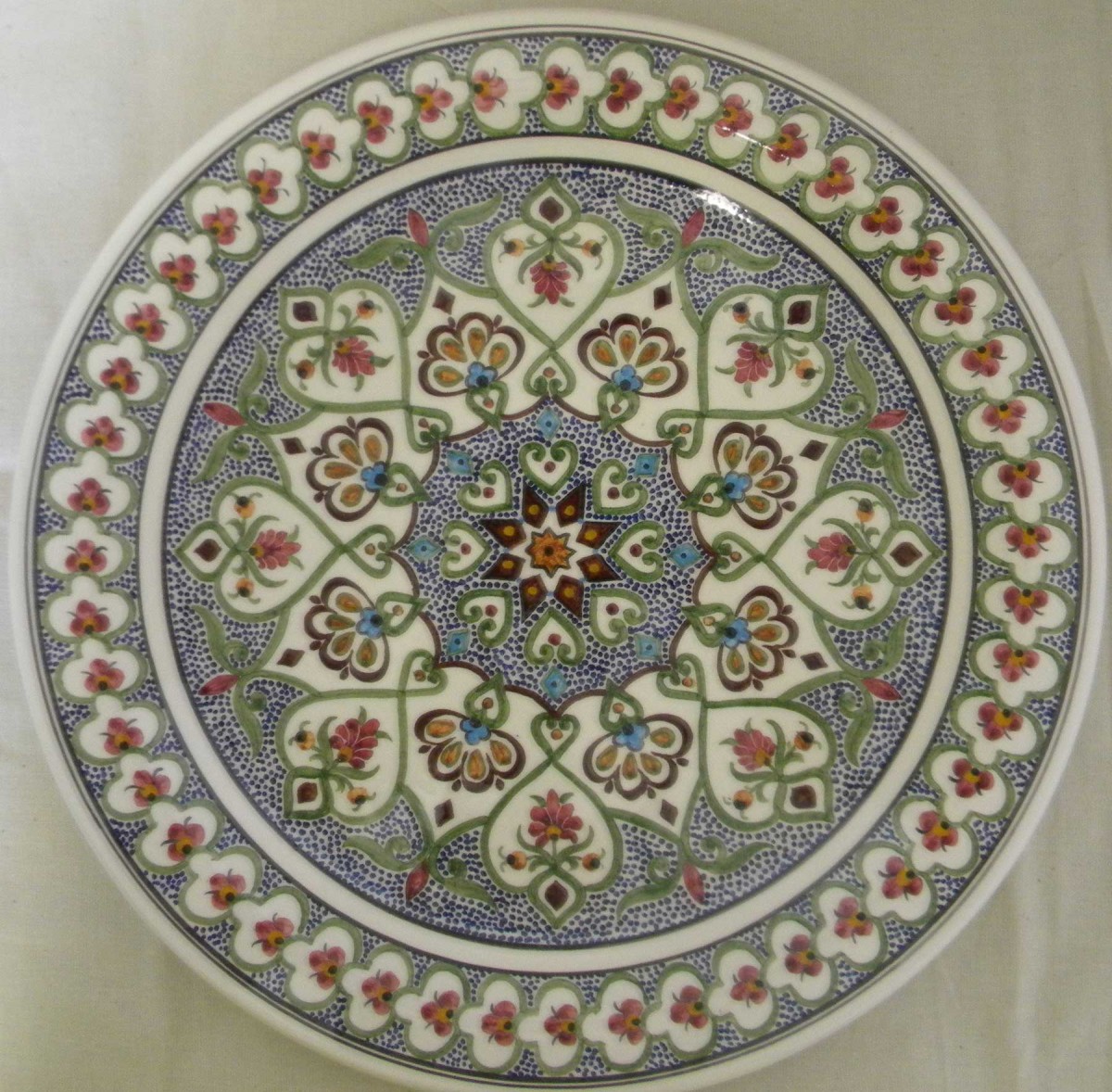 Glazed plate
with fine painted decoration of Asia Minor type by the potter –vase painter Costas Eliades
end of 20th century. 
