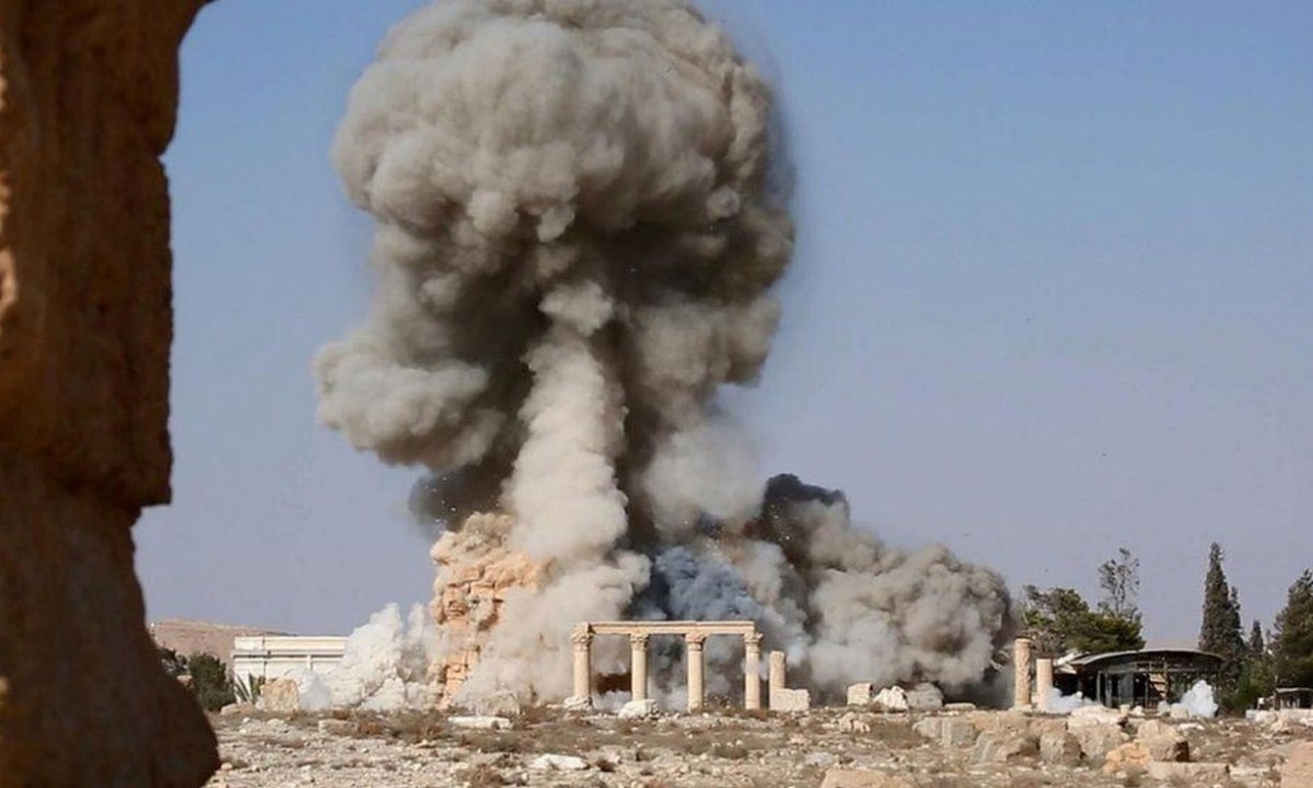 A few days ago the IS published pictures in social media, showing monuments at Palmyra being blown up. Photo Credit: The Guardian.