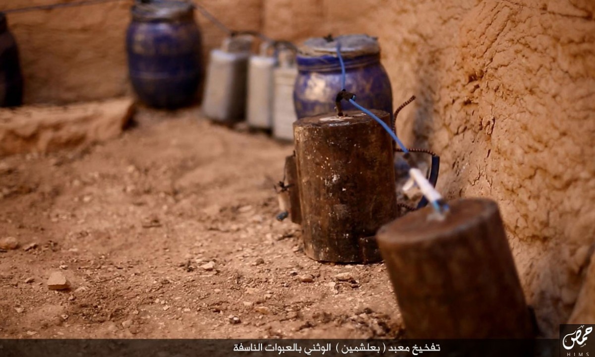Photographs of IS setting explosives to blow up monuments in Palmyra have appeared in social media last week. Photo Credit: The Guardian.