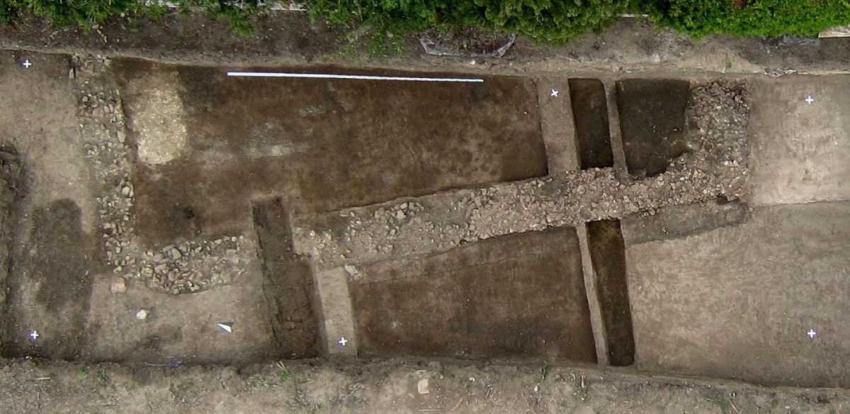 Aerial image of the foundation of a Roman stone building. Length of the leveling staff (White) at the upper edge of the Picture: 5 meters. Credit: Dennis Braks.