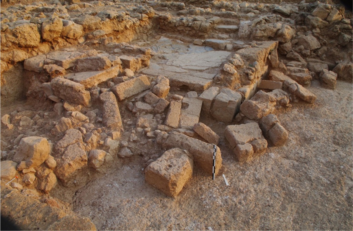 Paved room and collapsed monumental staircase at Sissi (J. Driessen). 
