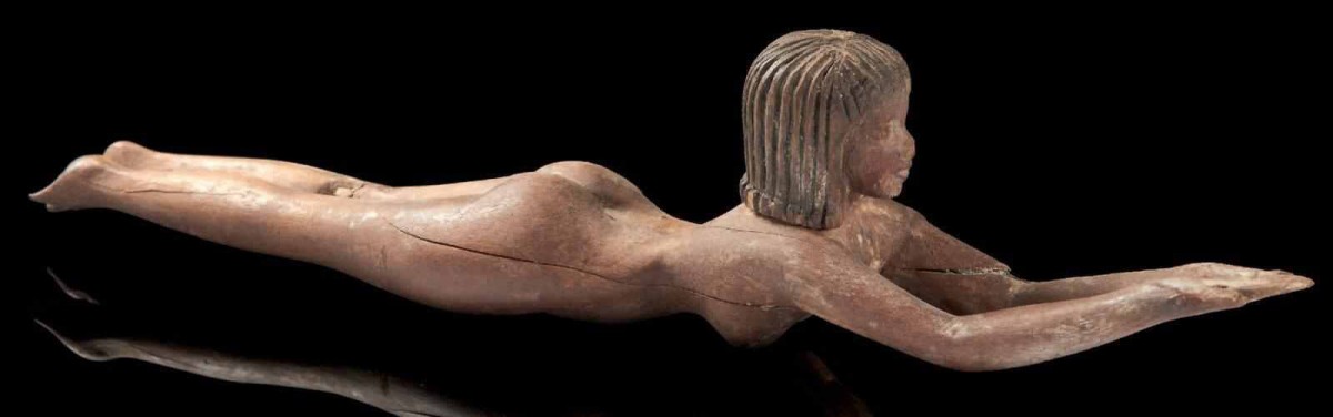 Old Kingdom wooden statuette, possibly representing a cosmetic tool. (Photo: Egyptian Ministry of Antiquities)