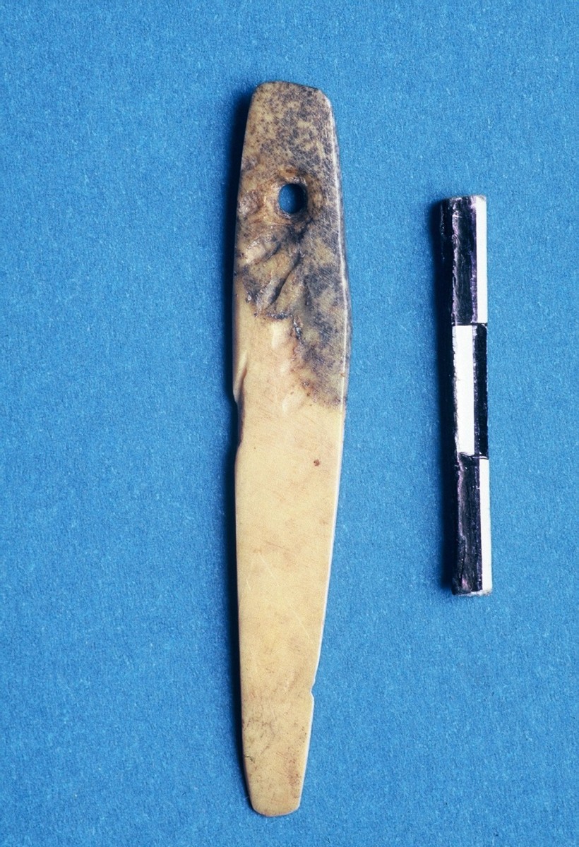 Fig. 29. Bone needle with eye, shaped from an animal’s rib.