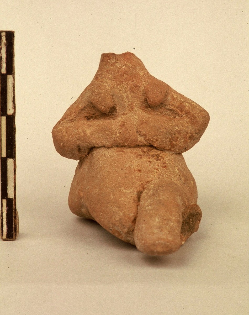 Fig. 35. Figurine of a seated woman from the Earlier or Middle Neolithic.
