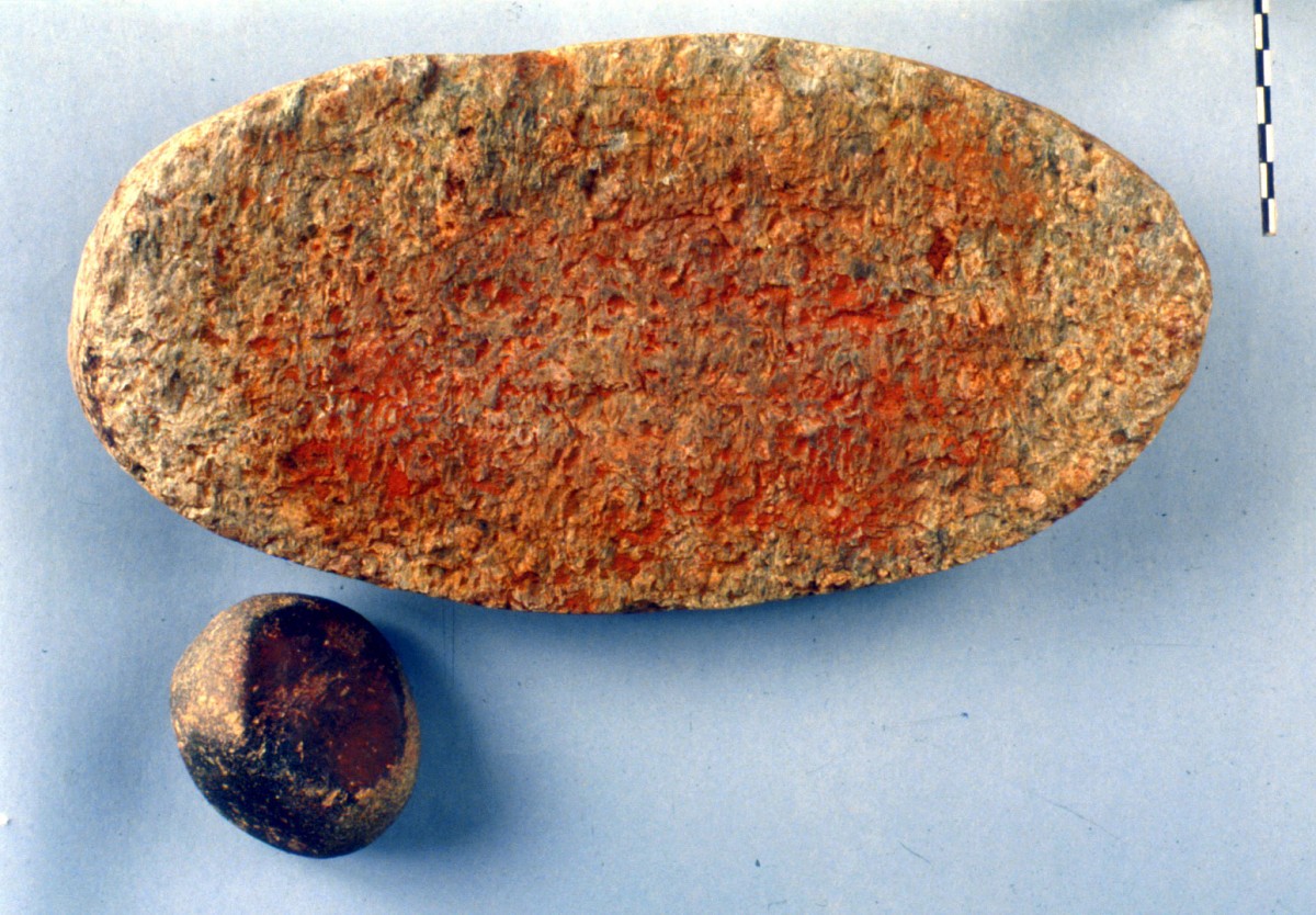 Fig. 45. Intact millstone with traces of red. The pestle has similar traces of colour.