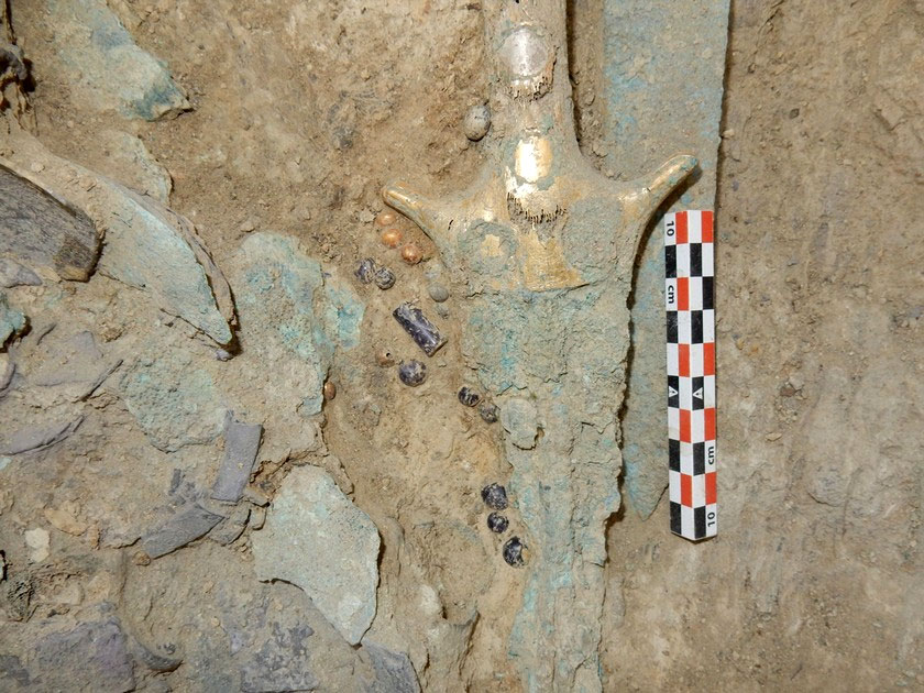 Seals, rings and the handle of a golden cup in the tomb of Pylos. Credit: Ministry of Culture and Sports