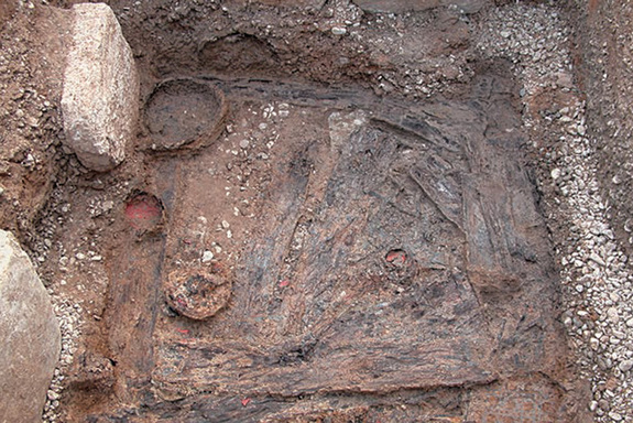 The pit where the dice, game pieces and tile were found along with other artifacts. Image Credit: courtesy Chinese Cultural Relics/Live Science.