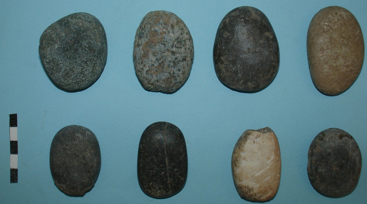 Fig. 8. Stone tools without a cutting edge, with one surface smoothed through use.