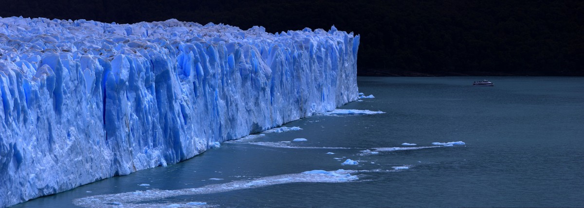 The Perito Moreno glacier forms a 60-metre (200 ft) high ice wall before falling into Lago Argentino. Photo credit: Martin St-Amant - Wikipedia - CC-BY-SA-3.0