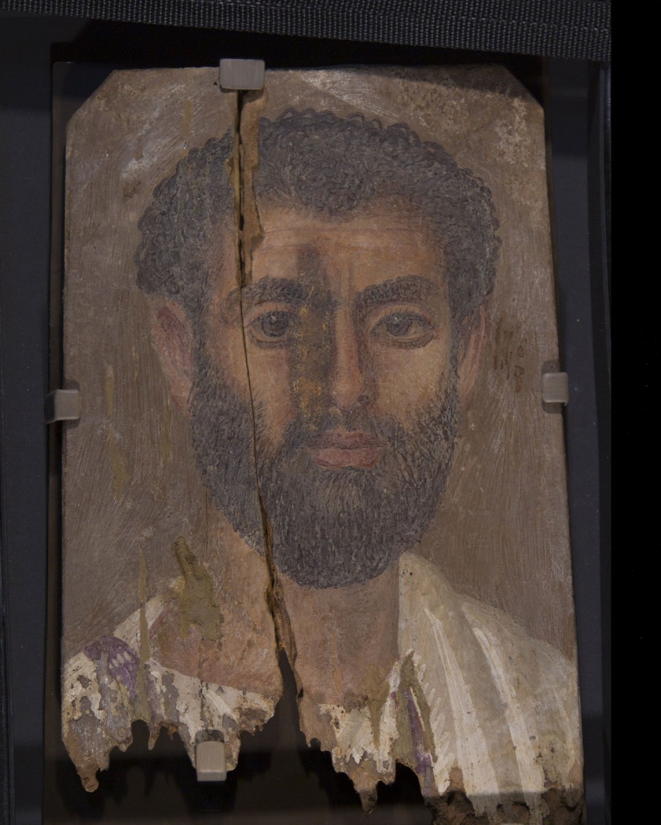 The well-preserved mummy portraits are extremely lifelike paintings of specific deceased individuals. They were excavated more than 100 years ago at the site of Tebtunis (now Umm el-Breigat) in the Fayum region of Egypt. 