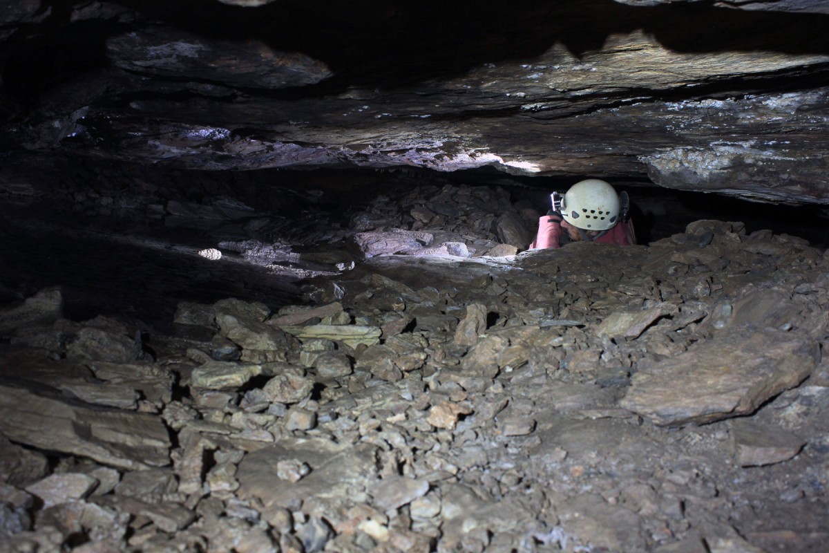 Thorikos: (Greece) Prehistoric mining works during exploration phase. Stoping area in flat bedded formation: the mineralization is to be located between two strata. On the floor, heap of waste deposits abandoned by the miners. Photograph: D. Morin