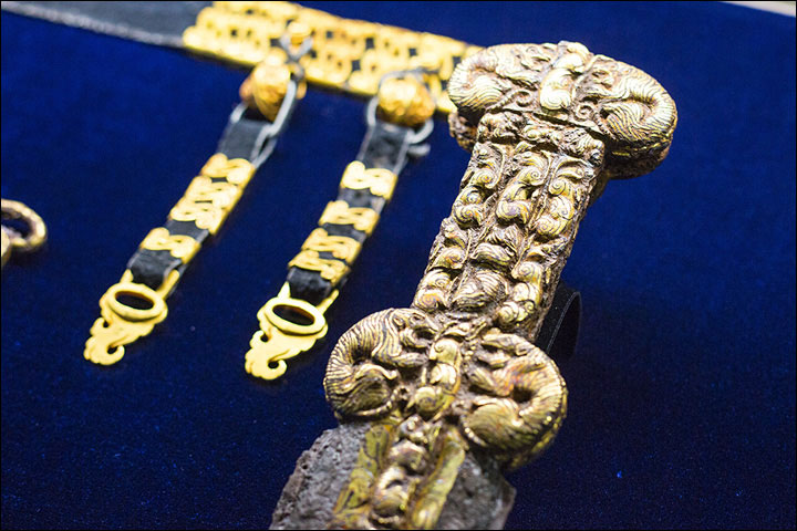 Decorations on the akinak - or short sword - show similarities to patterns used in Eastern Zhou (Eastern China). Photo Credit: The Siberian Times/Vera Salnitskaya.