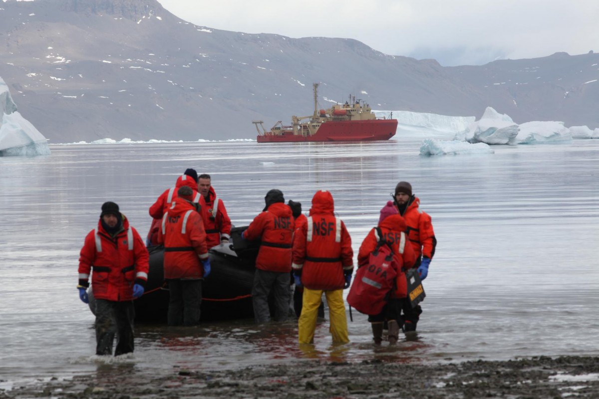 Researchers disembark on Antarctica during an expedition in 2011. AP3