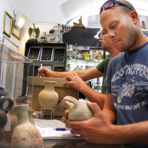 Hundreds of ancient artifacts seized during a raid on a souvenir shop in Jerusalem