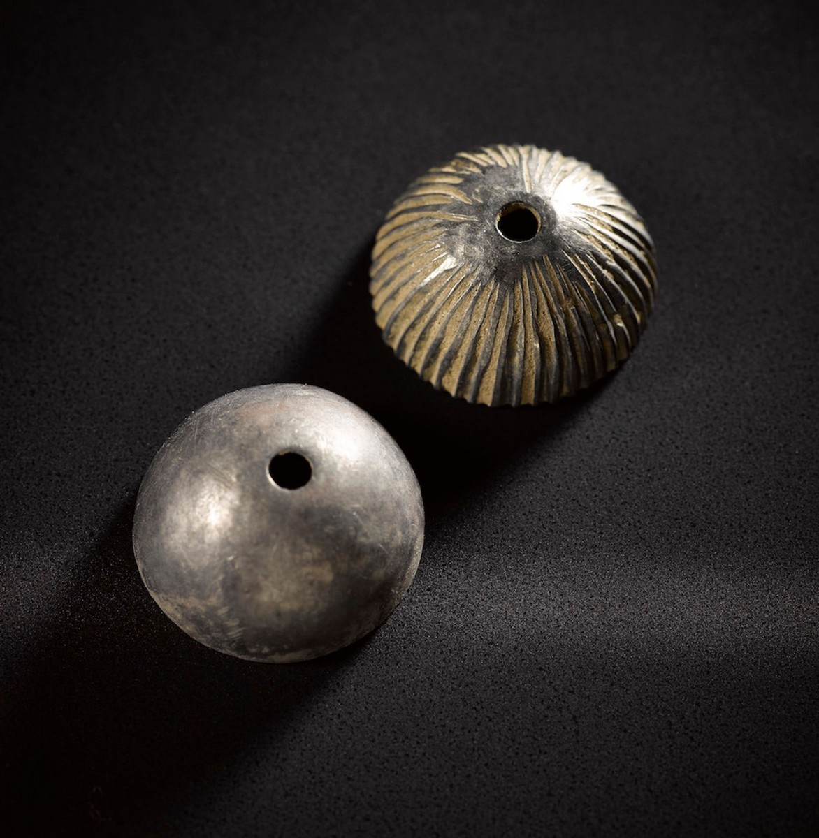 Two hemispheres made out of silver. Photo Credit: Live Science.