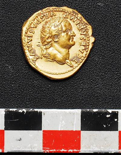An undated picture of a gold coin recently discovered near Pompeii. Photo Credit: Pompeii Archaeological Site Press Office/Phys.Org.