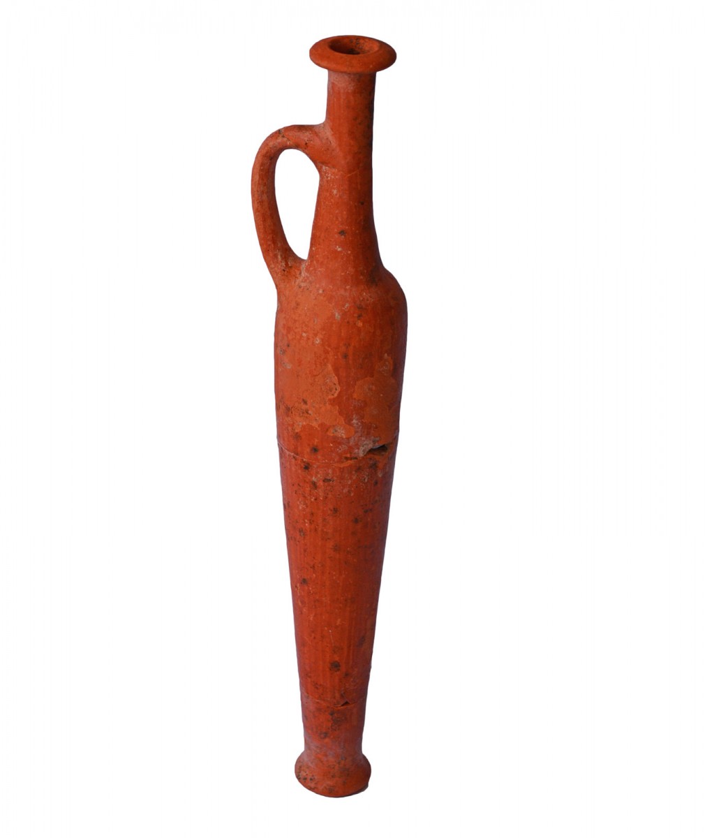 Red Lustrous Wheel-made spindle bottle.