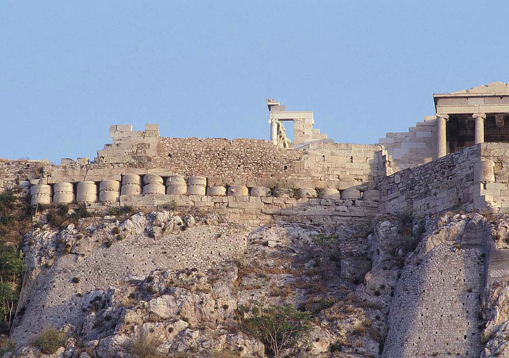 Column drums of the Pro-Parthenon incorporated in the northern wall of the Acropolis. Photo Credit: YSMA.