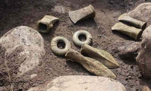 These socketed axes were also discovered. Photo Credit: Dalya Alberge/The Guardian.