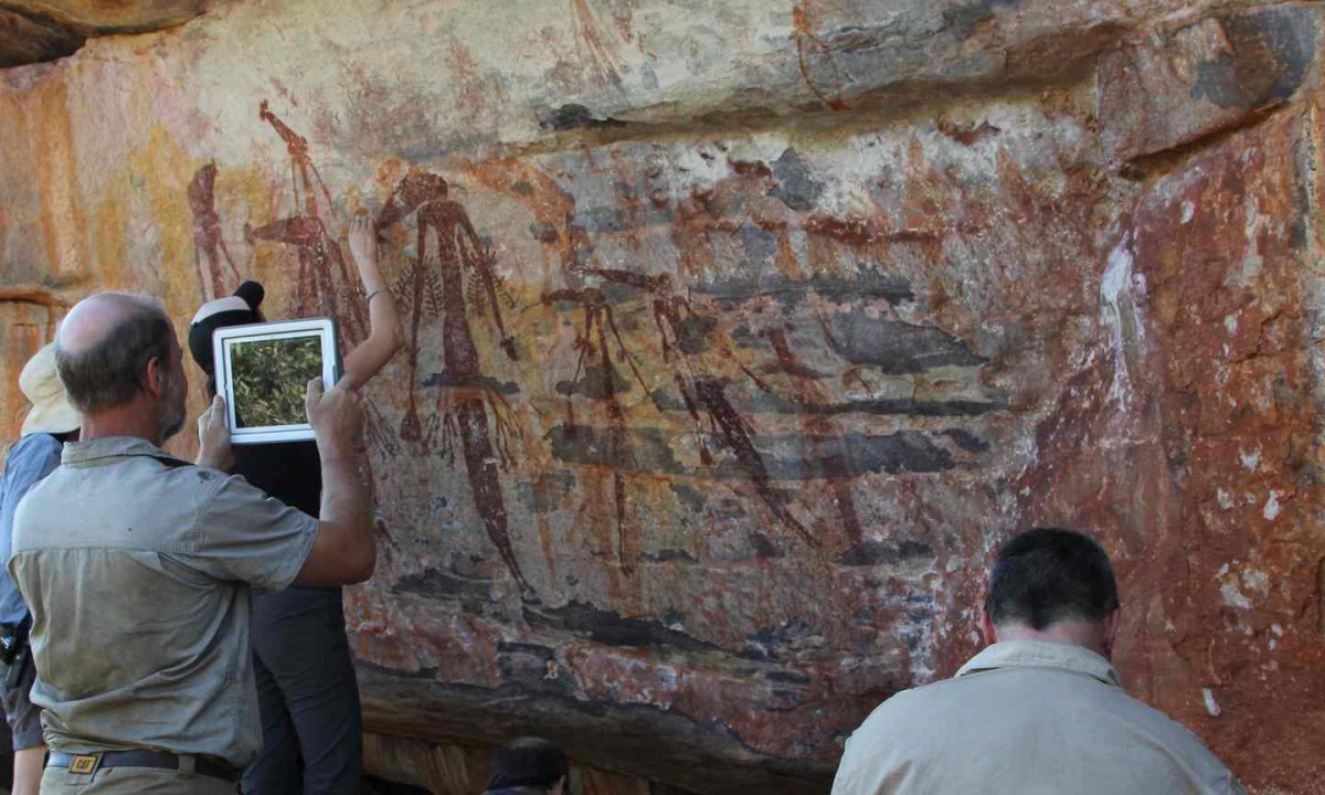 Archaeologists and geochronologists at a Gwion site on the King George River.
Photo Credit: The Guardian/University of Western Australia.