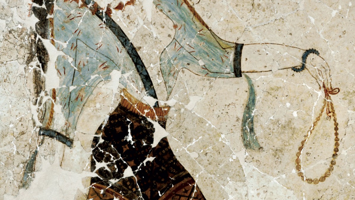 Detail from the wall-painting on the north wall of the so-called Lustral Basin. The female figure depicted here is an “Adorant”. She wears a gossamer bodice and outstretches her left hand holding a precious necklace. Xeste 3, Akrotiri, Thera. 
