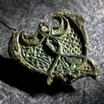 How did a fitting from an Irish horse’s harness end up as a brooch for a Norwegian Viking woman?