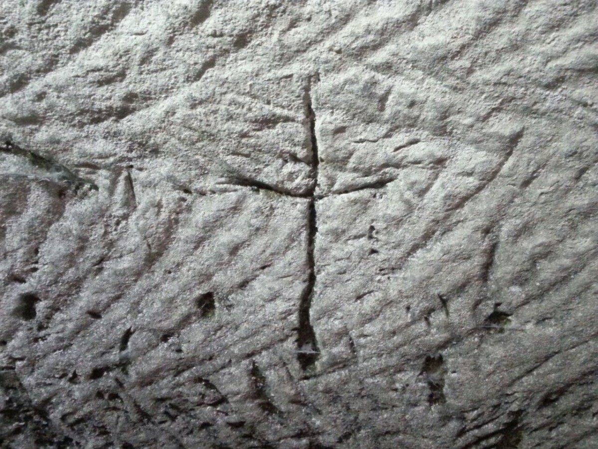 Engraving of a cross. Credit: IAA