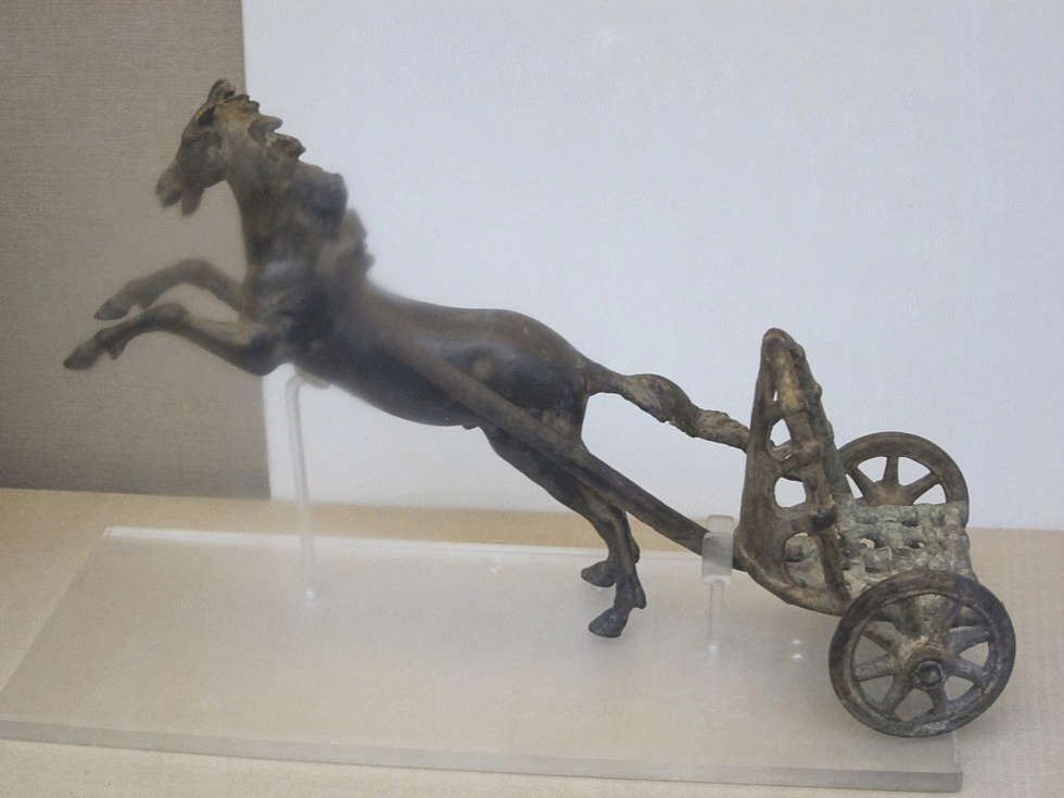 A toy model of an ancient Roman, two-horse racing chariot. Photo credit: Bela Sandor/Seeker.