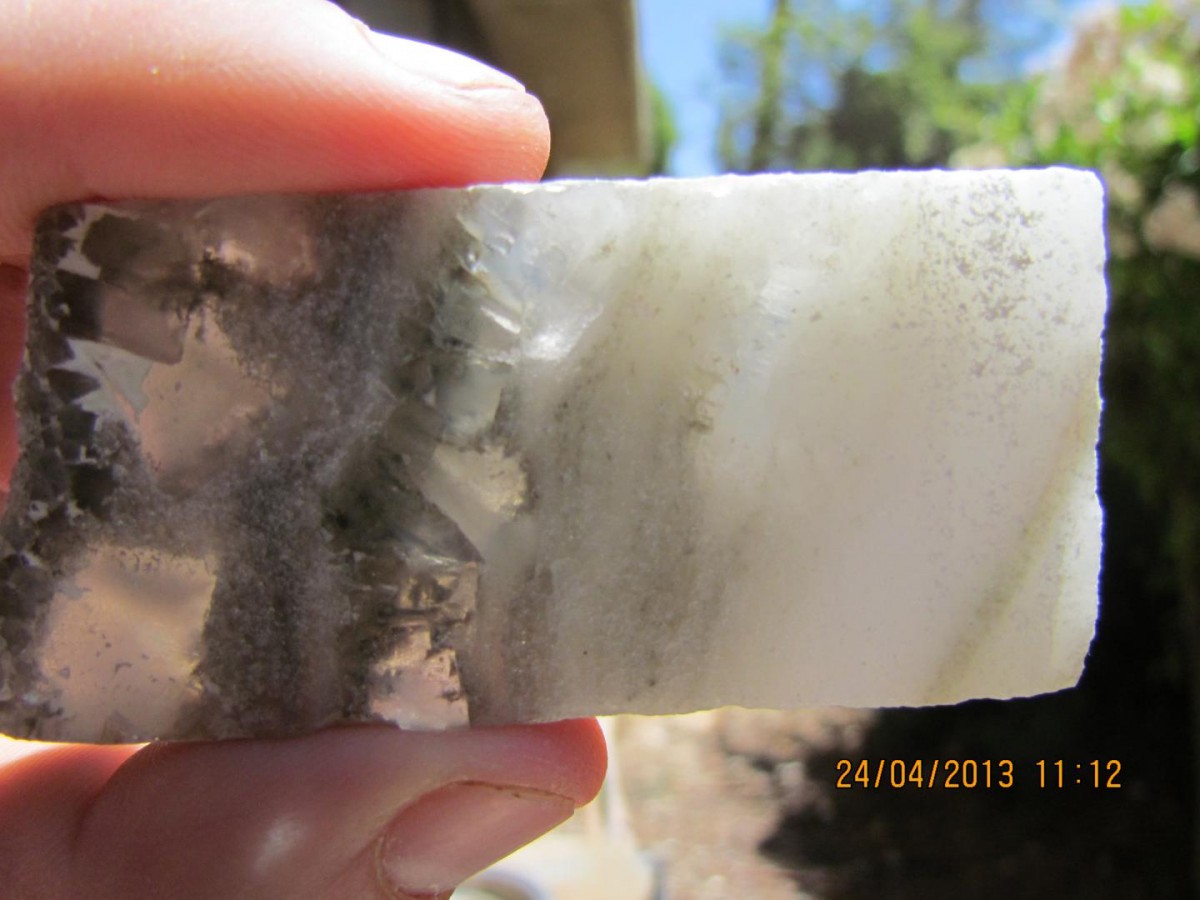 Deep below the seabed, drilling revealed thick layers of salt, precipitated out during past warm, dry periods. In this specimen, transparent crystals (left) formed on what was then the bottom during winter; finer white ones (right) formed on the water surface in summer and later sank.
Credit: Yael Kiro/Lamont-Doherty Earth Observatory